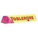 Молочный шоколад Toblerone c изюмом, нугой из меда и миндаля , 100 гр 951962436 фото 1